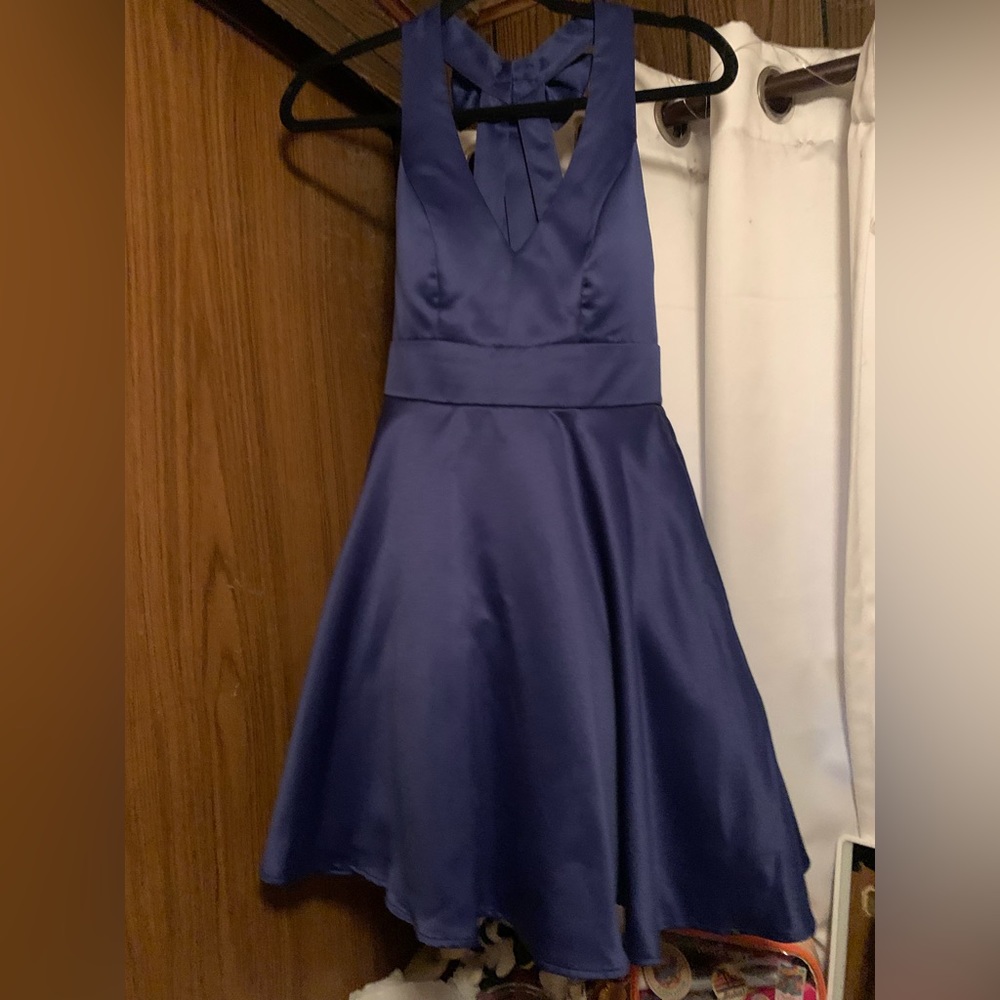 Homecoming dress from David’s bridal size 1 and navy blue. All sales are final